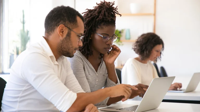 Internships, Learnerships & Bursaries in Gauteng: Where to Start Instructor explaining corporate software specific to intern