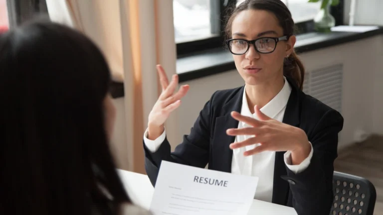 Top 10 Interview Questions and Potential Answers for South African Job Seekers in 2025 Lady sitting in an interview and answering questions