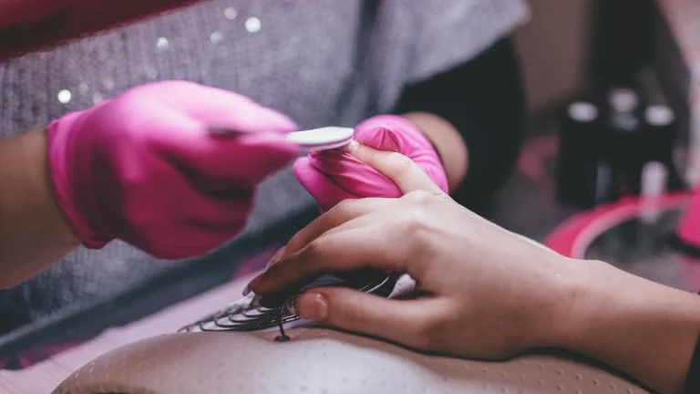 Winter Nail Inspiration: 20 Gorgeous Ideas for 2025 Lady getting manicure