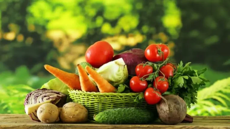 Immune Boosters from the Garden: Natural Ways to Stay Healthy Fresh moringa leaves, garlic bulbs, ginger root, and turmeric in a basket