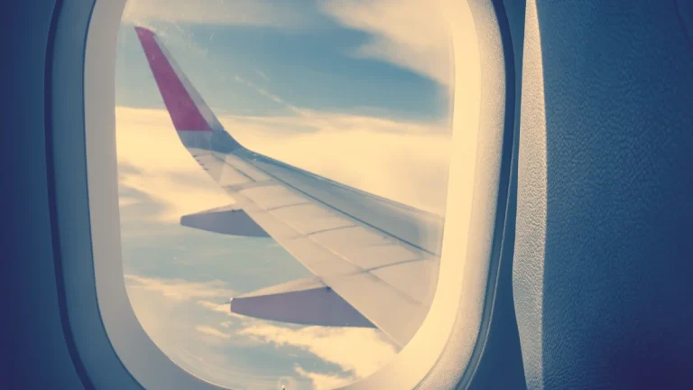 Top Countries South Africans Can Visit Without a Visa in 2025 — and Save on Currency Exchange airplane window