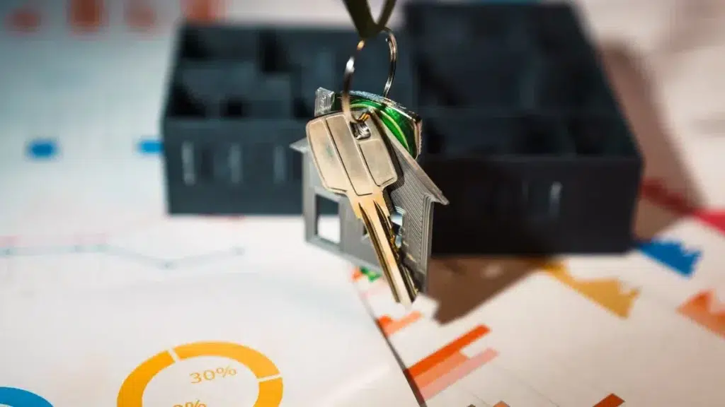 How to Qualify for a Home Loan in South Africa: A Step-by-Step Guide - real estate market economy finance charts door key statistics home cross section price statistics bars - From Unsplash - https://unsplash.com/photos/a-house-shaped-keychain-hanging-from-a-key-chain-6TIlcP5af08